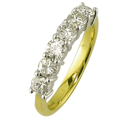 Seven stone diamond set ring set in platinum and yellow gold