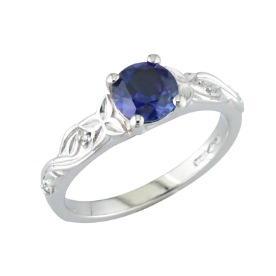 Sapphire leaf and vine style shoulder solitaire