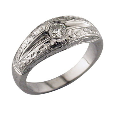 Heavy platinum and diamond antique style ring