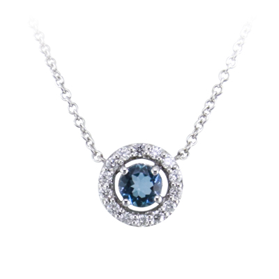 Aquamarine and diamond halo pendant