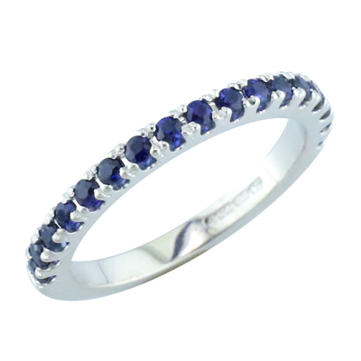 Sapphire claw set eternity ring