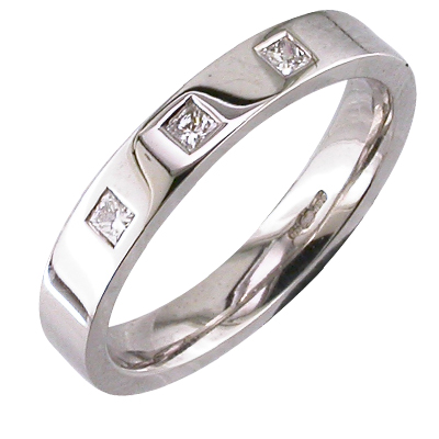 Platinum band with princess cut diamonds flush set into the band