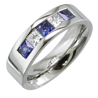 Sapphire and diamond heavy platinum channel set ring