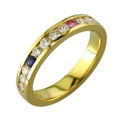 Gold channel set ring with a pink and blue sapphires representing