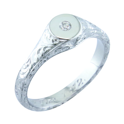 Single stone ring with antique engraving