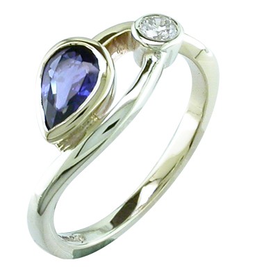 Modern, pear shaped Sapphire and diamond rub over set two stone ring