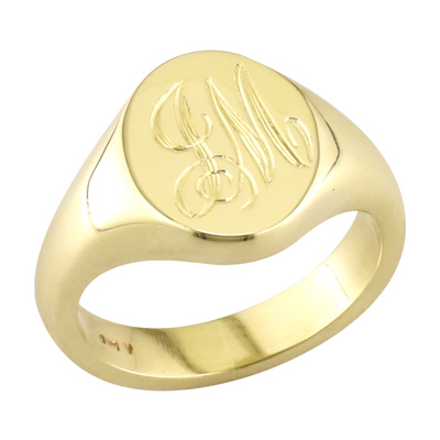 Gold, oval signet ring with hand engraved initials