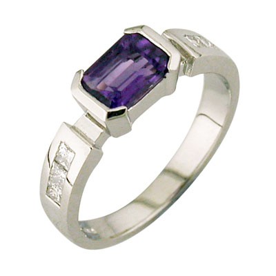 Emerald cut Amethyst platinum ring with princess cut diamond channel set shoulders. shoulders