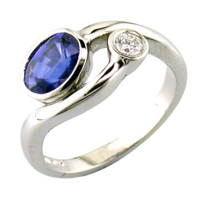 Sapphire and diamond two stone platinum twist style ring