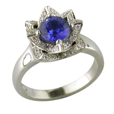 Sapphire and diamond flower style platinum ring