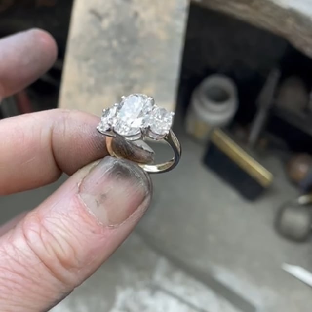 Oval shaped diamond three stone