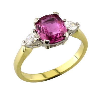 Pink tourmaline and pear shaped Diamond three stone  ring, set in platium and 18ct yellow gold