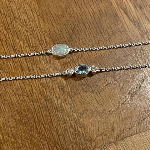 Aquamarine and diamond bracelet and an opal bracelet