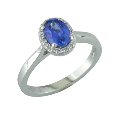 Sapphire and diamond halo cluster ring set in platinum