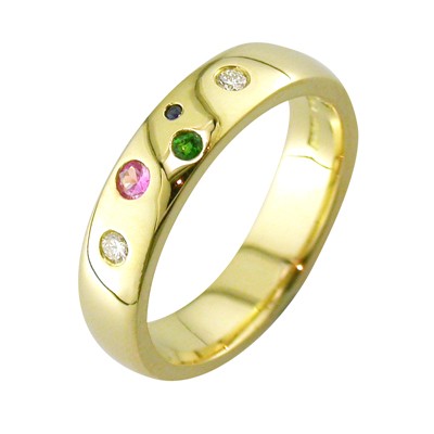 Gold family birthstone ring, set with a diamond, tsavorite and sapphires
