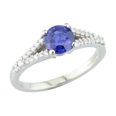 Platinum, sapphire and diamond ring with split shoulders