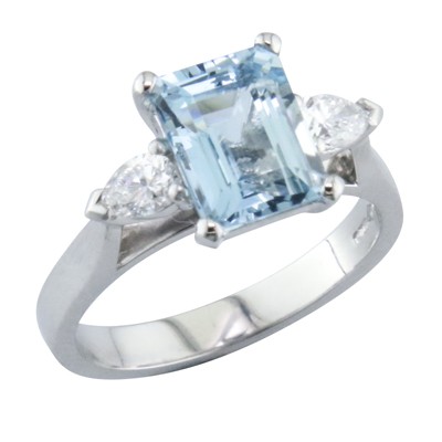 Aquamarine and pear-shaped diamond three stone platinum ring