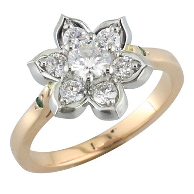 Diamond flower style cluster ring, mounted in white gold and rose gold