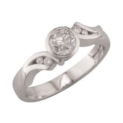 Platinum single stone diamond ring with channel set fancy shoulders