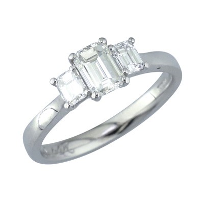 Platinum emerald cut three stoner ring