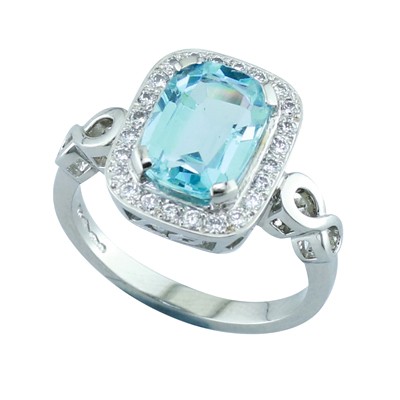 Aquamarine and diamond halo platinum cluster ring