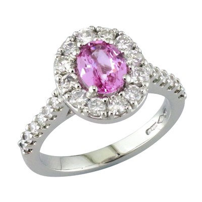 Pink sapphire and diamond halo cluster ring
