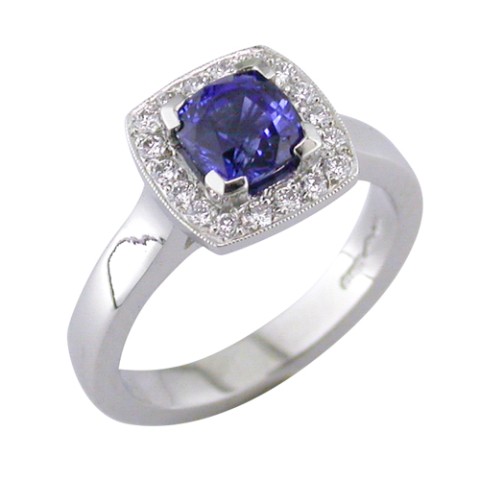 Sapphire and diamond halo platinum cluster ring