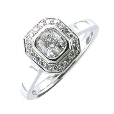Platinum cushion cut diamond halo cluster ring