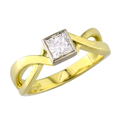 Princess cut diamond solitaire  with gold fancy shoulders