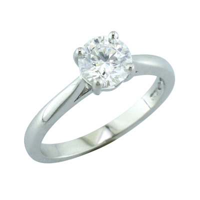 Diamond solitaire ring with a brilliant cut diamond and platinum mount