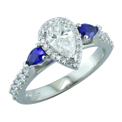 Pear shaped halo cluster ring with pear shape sapphire shoulders