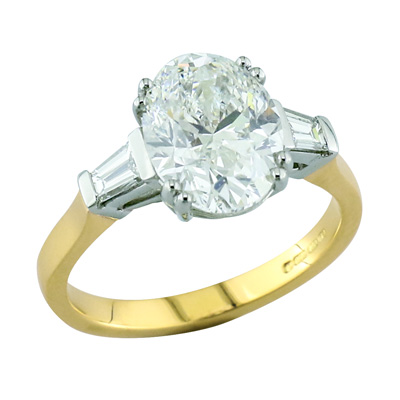 Oval diamond three stone ring