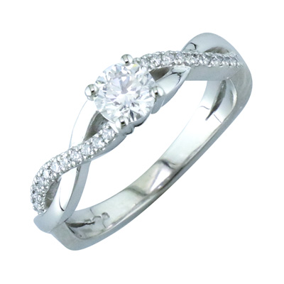Diamond solitaire ring with diamond twist shoulders