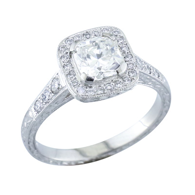 Cushion cut diamond halo ring with antique carved side wall