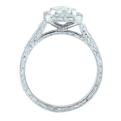 Cushion cut diamond halo ring with antique carved side wall
