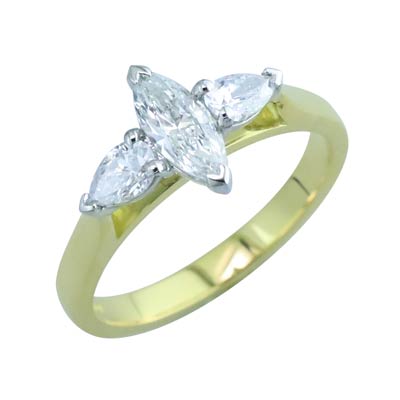 Marquise cut and pear cut diamond three stone ring