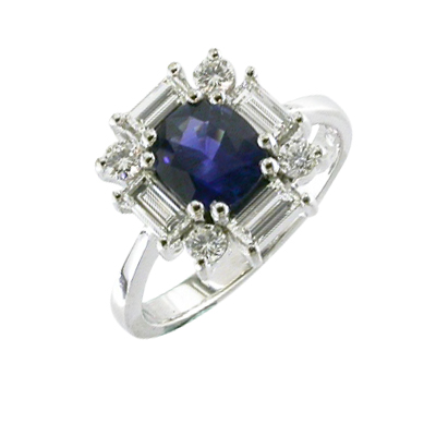 Blue sapphire and diamond halo cluster ring