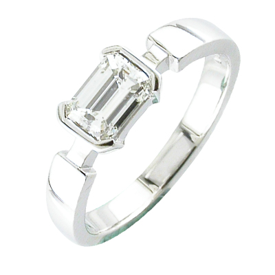 Platinum emerald cut diamond solitaire ring