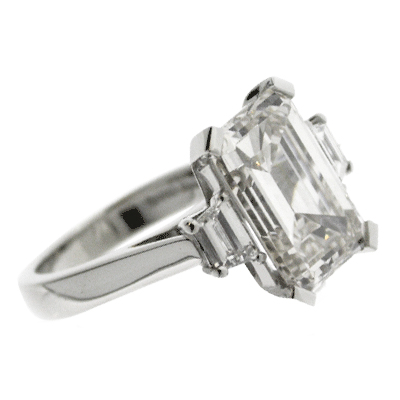 Emerald cut diamond three stone ring