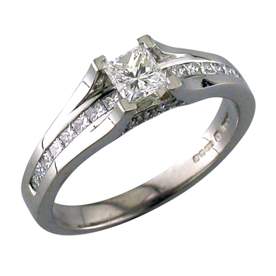 Princess cut diamond ring with channel set shoulders