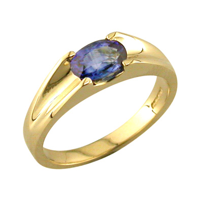 Oval sapphire and diamond yellow gold ring