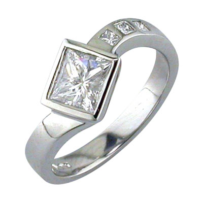 Princess cut diamond bezel set twist style ring