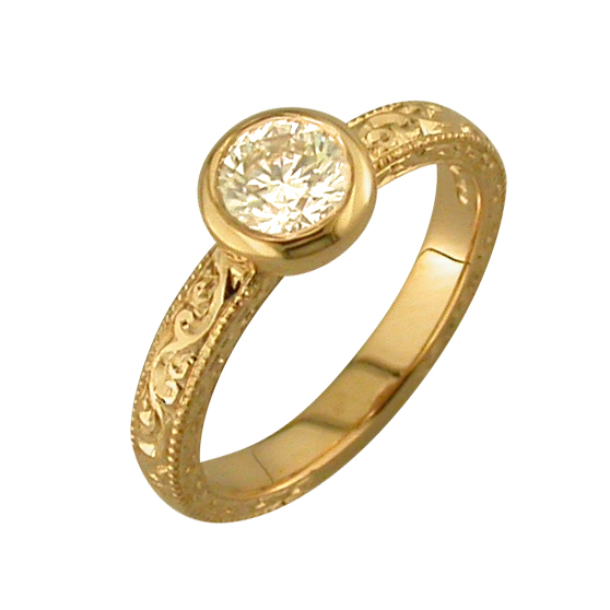 Diamond solitaire with antique engraving