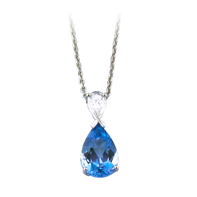 Blue Topaz and pear-shaped diamond pendant