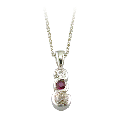 Ruby and diamond bezel set pendant