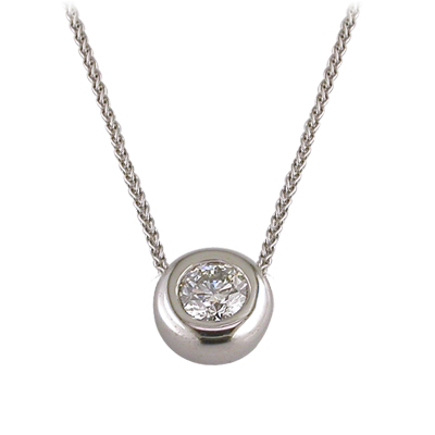 White gold, heavy rub over set diamond pendant