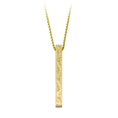 Gold bar pendant with hand carving