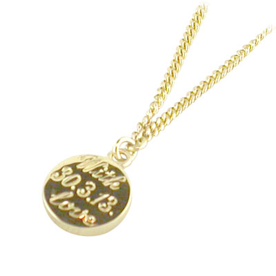 Yellow gold disc style pendant with engraving