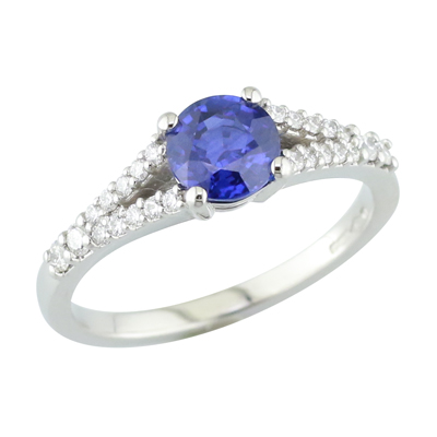 Platinum, sapphire, and diamond ring with split shoulders