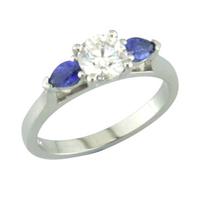 Sapphire and diamond three stone ring with pear shaped sapphires